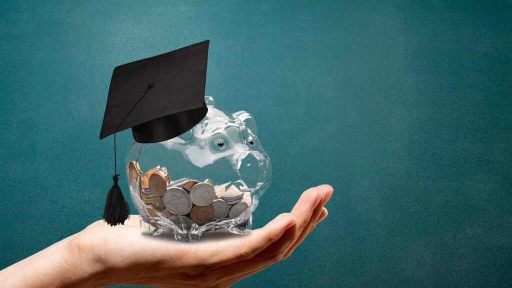 pig bank with coins and a graduation cap